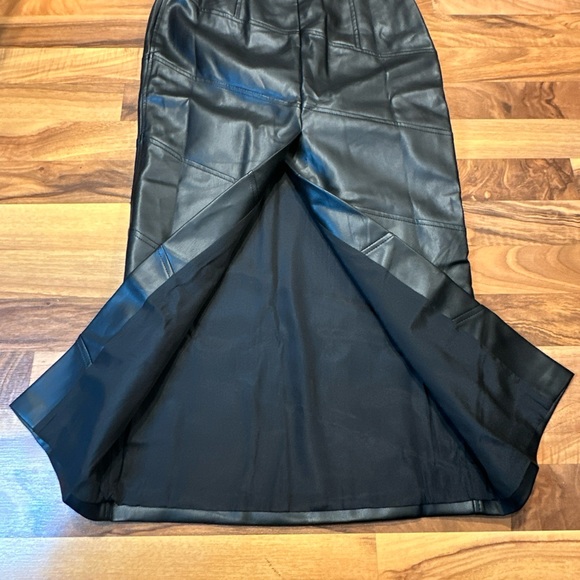 NWT Micas faux leather‎ skirt. Black zipper closure, slit in back. Size s… - Picture 3 of 5